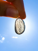 Saffordite Cintamani Stone Pendant